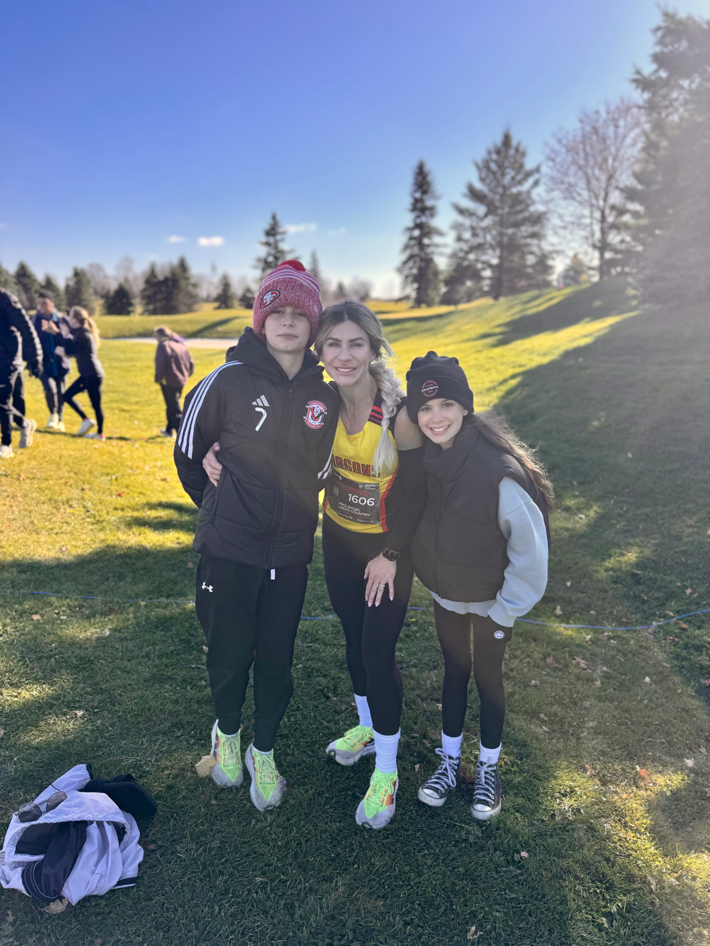 Mandy with her son and daughter at a provincial cross country race
